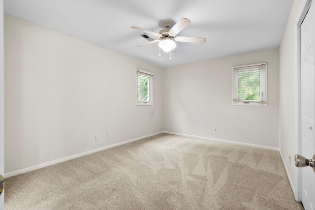 22 Ogier St, Charleston, SC 29403 - carpeted spare room with baseboards and ceiling fan