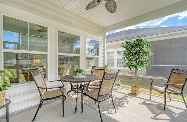 sunroom / solarium with ceiling fan