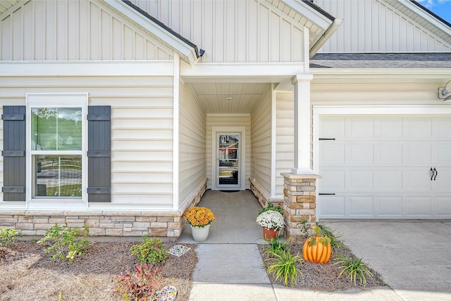 entrance to property featuring a garage