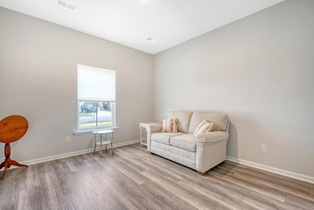 living area featuring hardwood / wood-style flooring