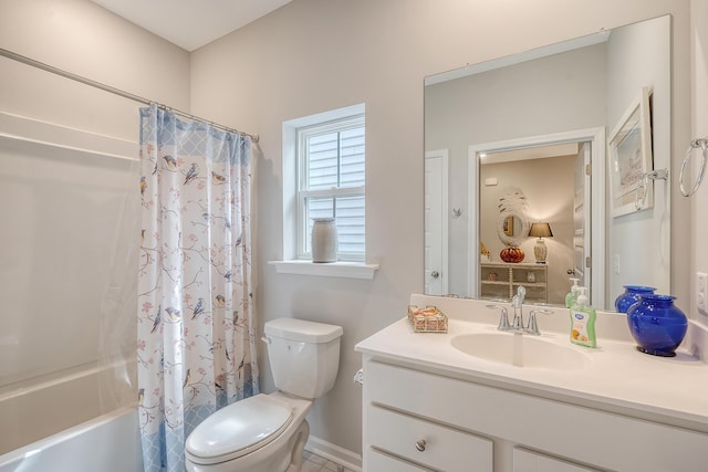 full bathroom with vanity, shower / bath combo with shower curtain, and toilet