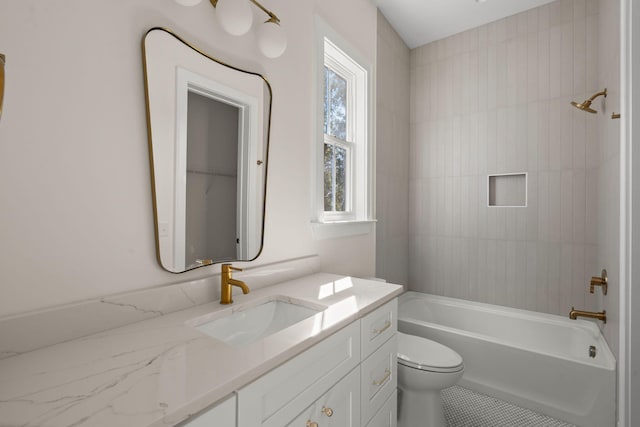 full bathroom featuring toilet, bathtub / shower combination, and vanity