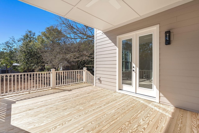 wooden terrace featuring french doors