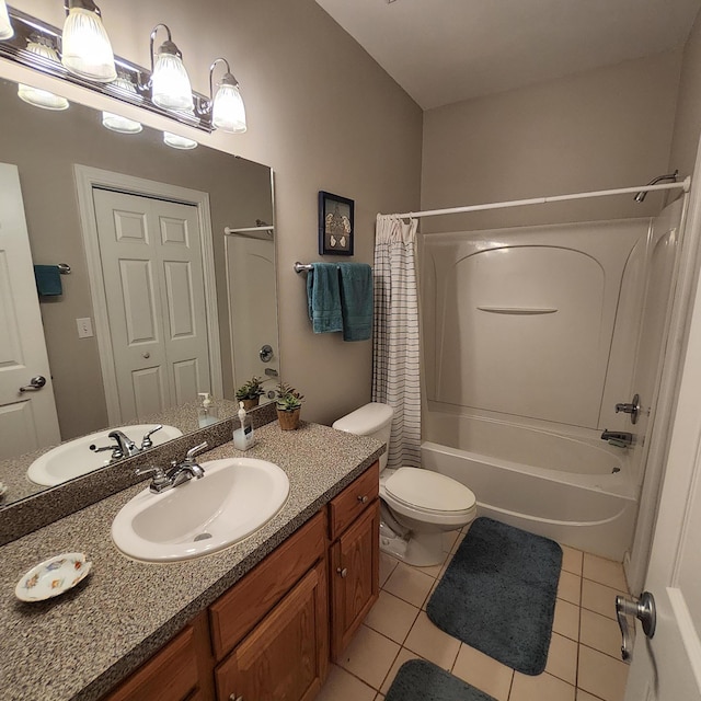 full bathroom featuring shower / bath combination with curtain, vanity, toilet, and tile patterned floors