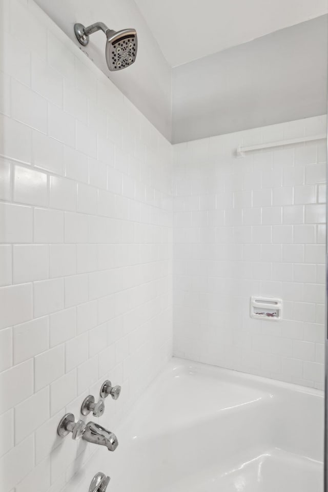 bathroom featuring washtub / shower combination