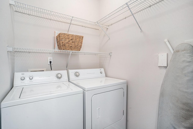 laundry area featuring independent washer and dryer