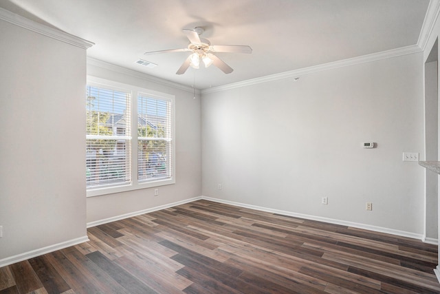 empty room featuring ceiling fan, dark hardwood / wood-style flooring, and ornamental molding