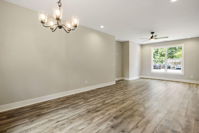 2960 Blackfish Rd, Johns Island, SC 29455 - spare room with wood finished floors, a ceiling fan, baseboards, recessed lighting, and a chandelier