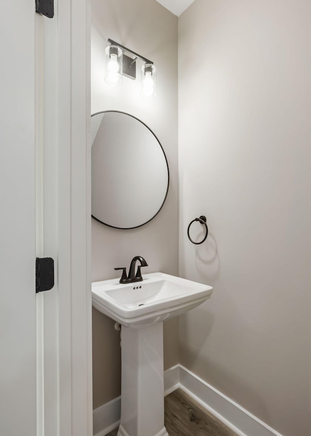 2960 Blackfish Rd, Johns Island, SC 29455 - bathroom with baseboards, wood finished floors, and a sink