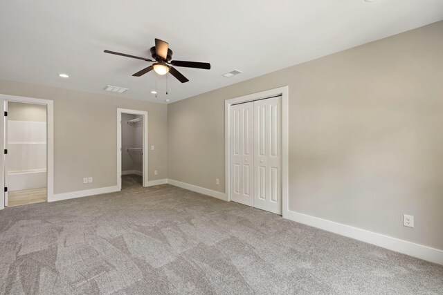 2960 Blackfish Rd, Johns Island, SC 29455 - unfurnished bedroom featuring baseboards, carpet flooring, connected bathroom, ceiling fan, and recessed lighting