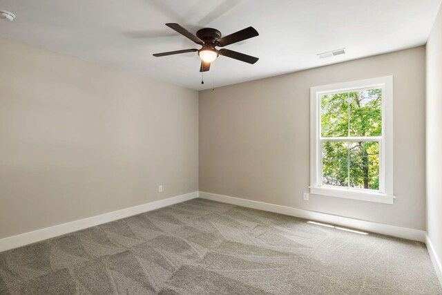 2960 Blackfish Rd, Johns Island, SC 29455 - unfurnished room featuring carpet floors, ceiling fan, and baseboards