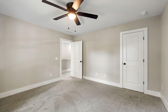 2960 Blackfish Rd, Johns Island, SC 29455 - unfurnished bedroom with carpet, baseboards, and ceiling fan
