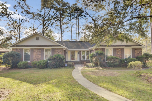 ranch-style house with a front yard