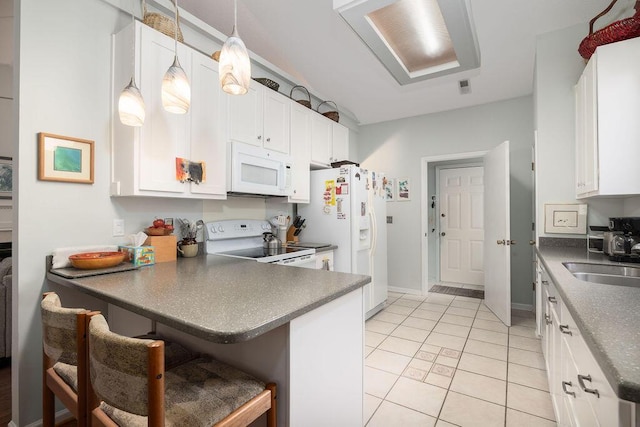 1578 Harborsun Dr, Charleston, SC 29412 - kitchen with white cabinetry, light tile patterned floors, a sink, and white appliances