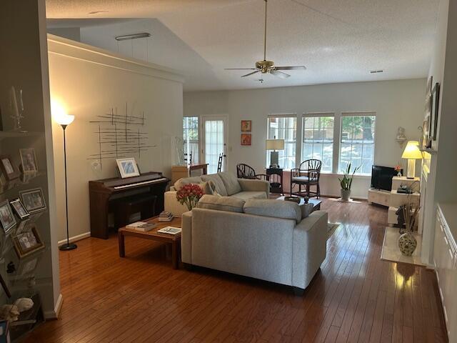1578 Harborsun Dr, Charleston, SC 29412 - living area featuring a ceiling fan, a wealth of natural light, and dark wood-style floors