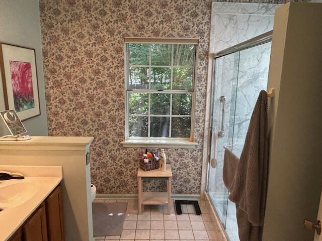 1578 Harborsun Dr, Charleston, SC 29412 - full bathroom featuring tile patterned flooring, vanity, toilet, wallpapered walls, and a stall shower