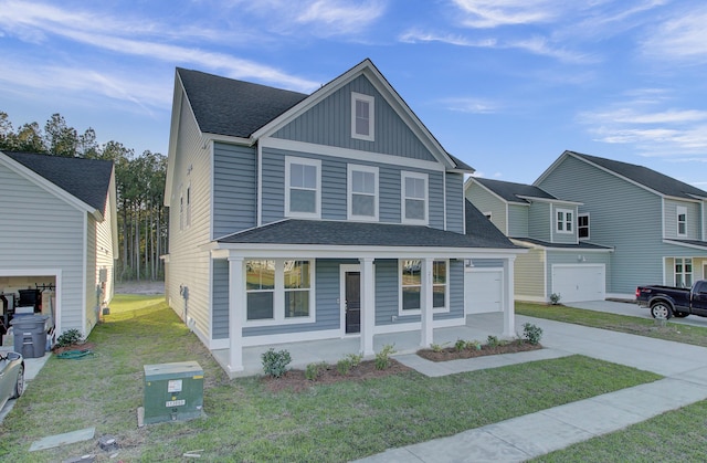view of front of home featuring a shingled roof, board and batten siding, concrete driveway, a garage, and covered porch