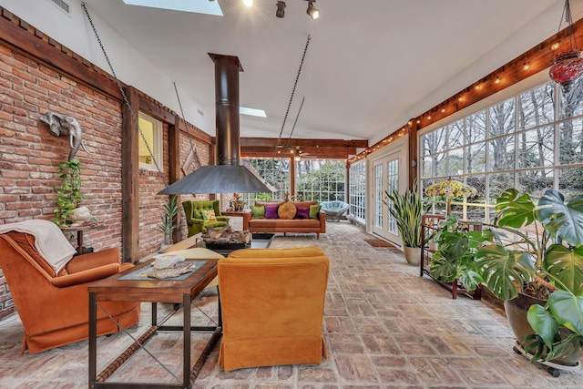 sunroom with a skylight