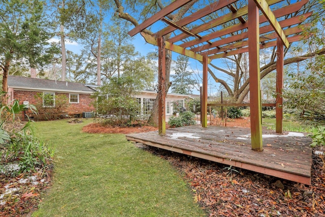 view of yard with a deck and a pergola