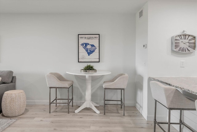 dining room featuring light wood-type flooring