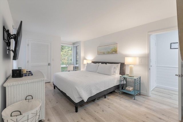 bedroom with light hardwood / wood-style floors