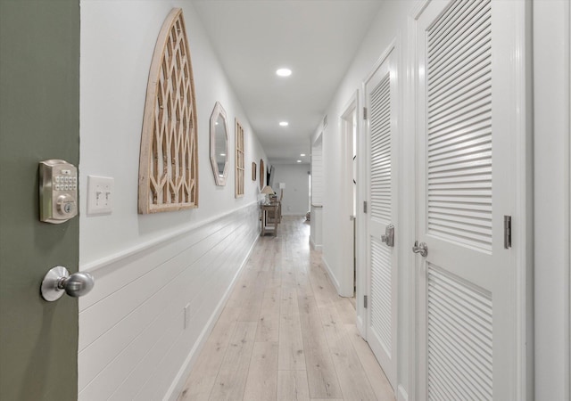 hallway featuring light wood-type flooring