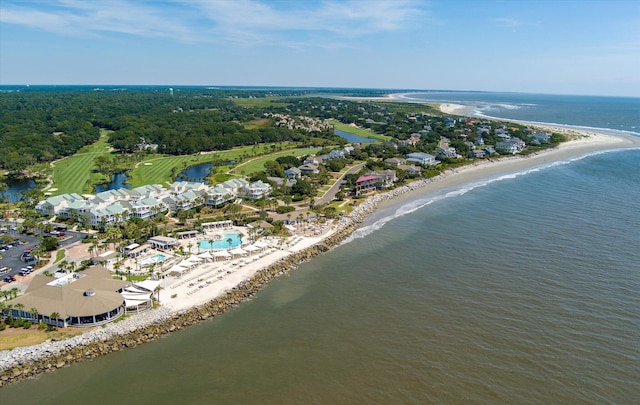 aerial view with a water view and a beach view