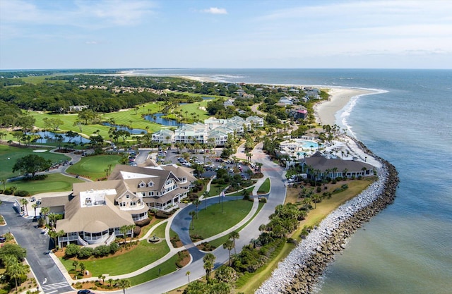 birds eye view of property with a view of the beach and a water view