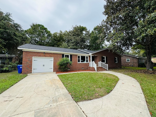 single story home featuring a front yard and a garage