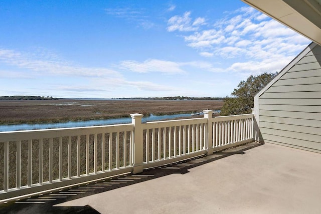 view of patio / terrace featuring a water view