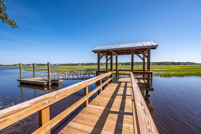 dock area featuring a water view and a gazebo