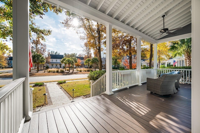 wooden terrace with ceiling fan