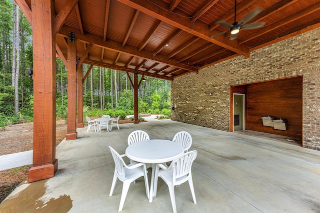 view of patio / terrace with outdoor dining space and a ceiling fan