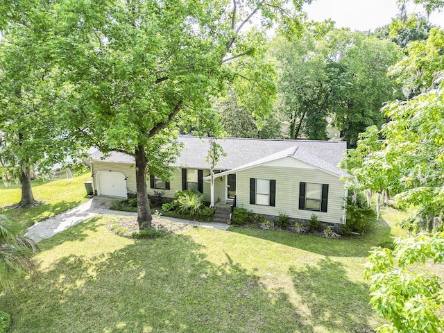 5 Drummond Ct, Charleston, SC 29414 - view of front of home featuring driveway, an attached garage, roof with shingles, and a front yard