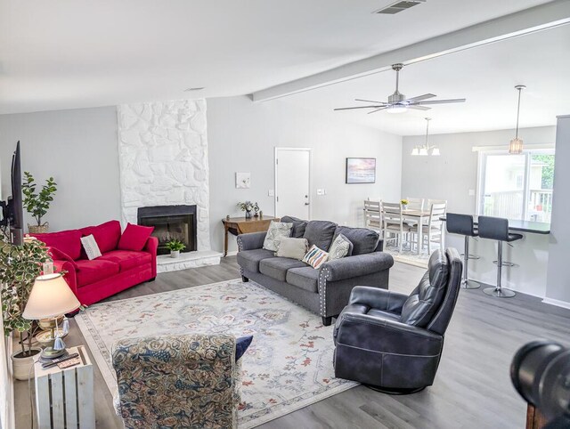 5 Drummond Ct, Charleston, SC 29414 - living room with wood finished floors, a ceiling fan, and a large fireplace