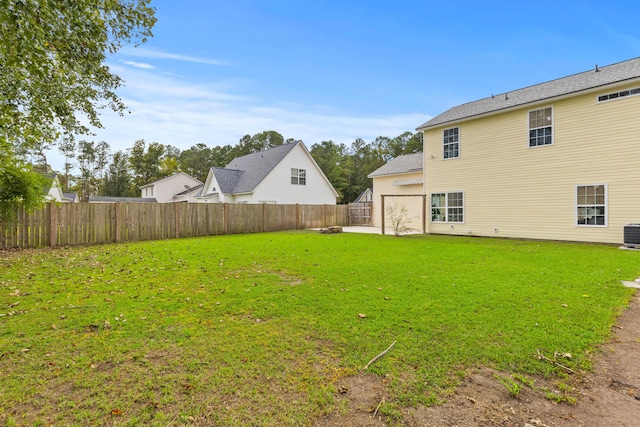 view of yard featuring central AC unit