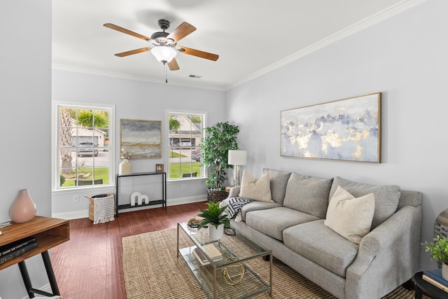 living room with ceiling fan, ornamental molding, and dark hardwood / wood-style flooring