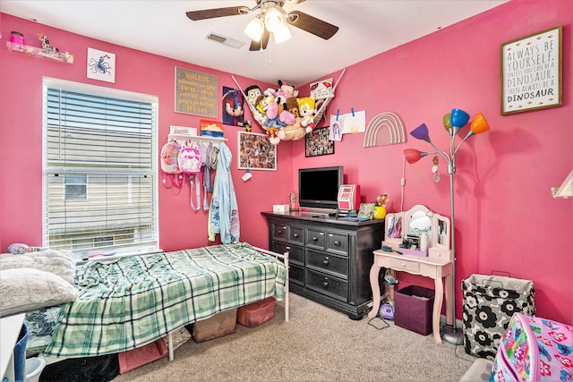 carpeted bedroom with ceiling fan