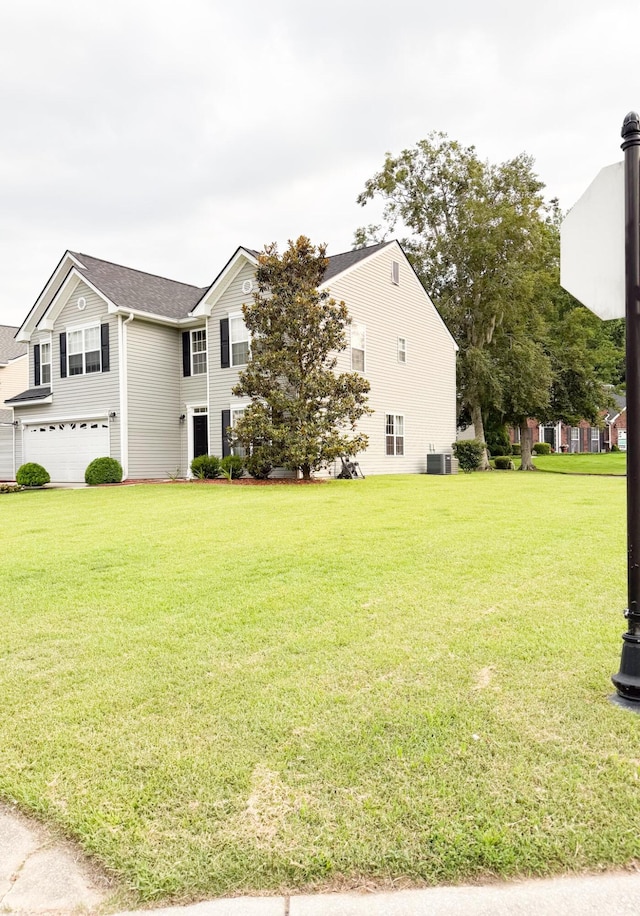 9229 N Moreto Cir, Summerville, SC 29485 - view of building exterior with an attached garage