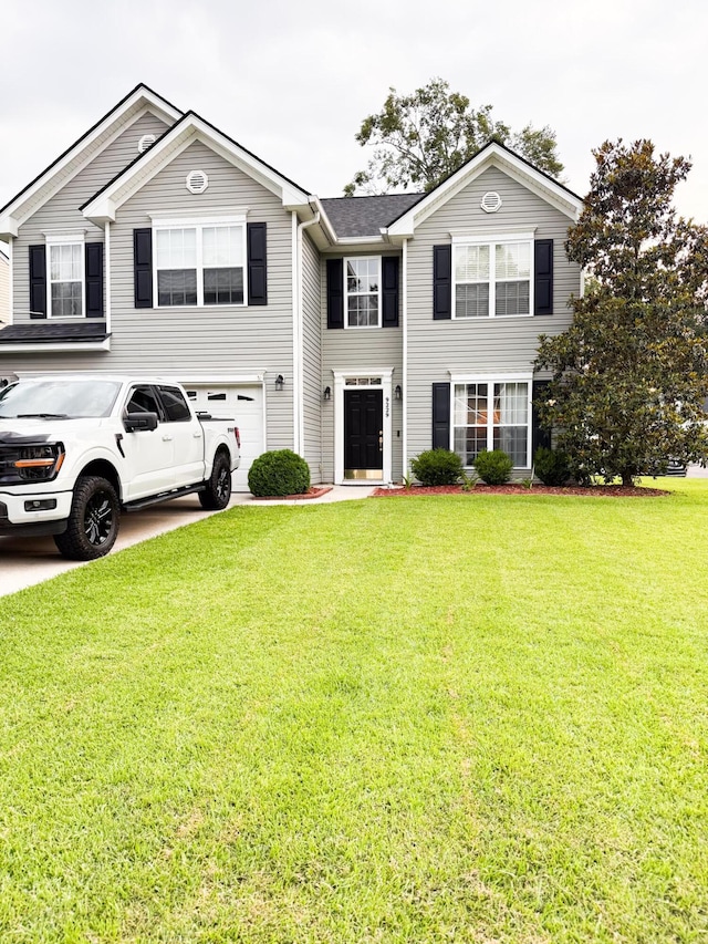 9229 N Moreto Cir, Summerville, SC 29485 - view of front of home with a garage, a front lawn, and driveway