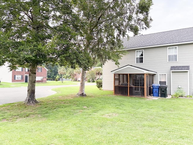 9229 N Moreto Cir, Summerville, SC 29485 - view of grassy yard with a sunroom