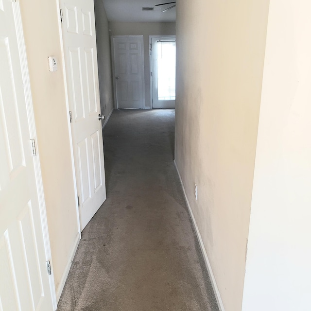 corridor with baseboards