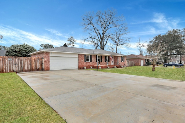 ranch-style home featuring driveway, fence, a front yard, a garage, and brick siding