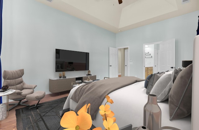 bedroom with connected bathroom, ceiling fan, high vaulted ceiling, and hardwood / wood-style flooring