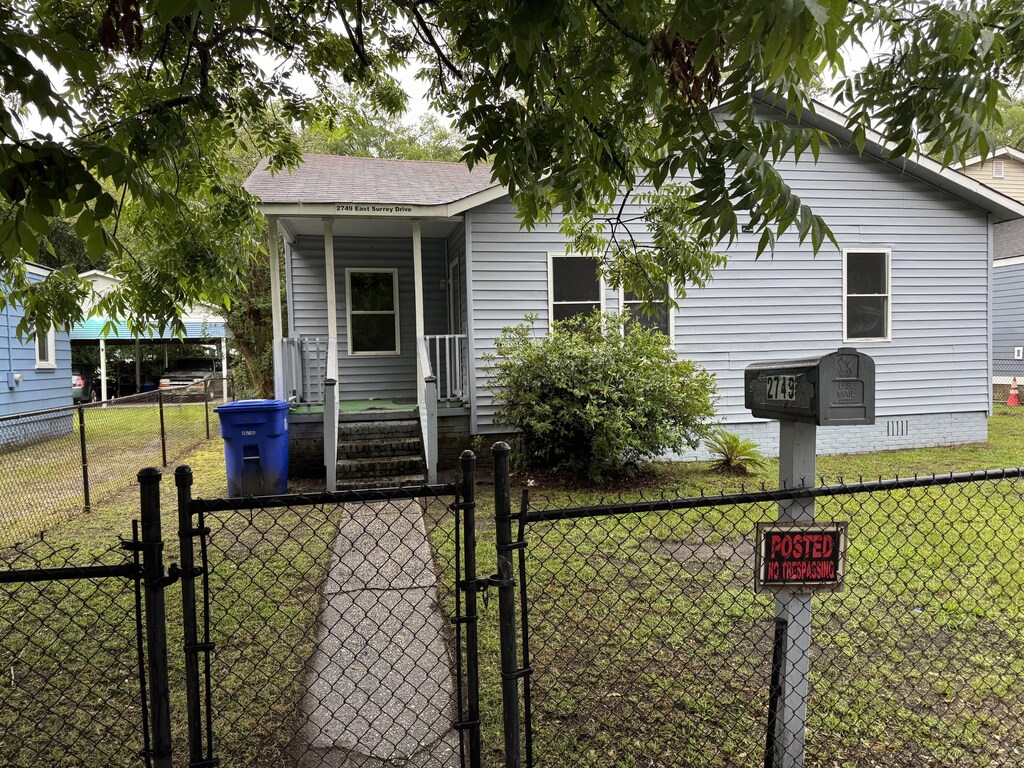 2749 E Surrey Dr, North Charleston, SC 29405 - view of front of house featuring a gate and crawl space