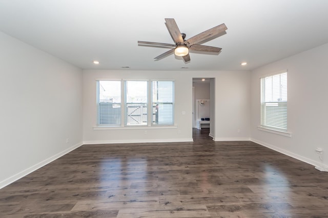 unfurnished room featuring ceiling fan, baseboards, dark wood-style floors, and recessed lighting