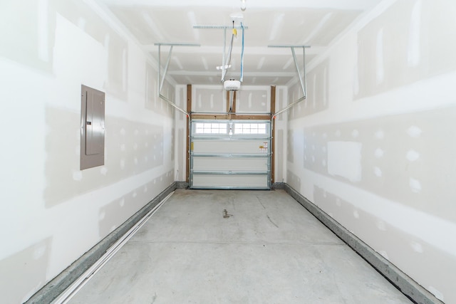 garage with electric panel and a garage door opener