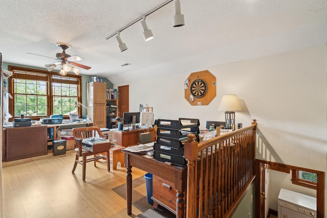 712 Wakendaw Blvd, Mount Pleasant, SC 29464 - office with a ceiling fan, wood finished floors, a textured ceiling, rail lighting, and lofted ceiling