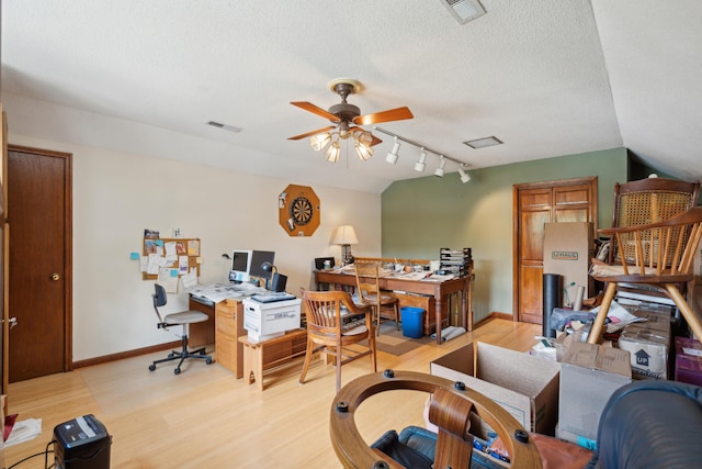 712 Wakendaw Blvd, Mount Pleasant, SC 29464 - home office featuring light wood finished floors, a ceiling fan, rail lighting, and a textured ceiling