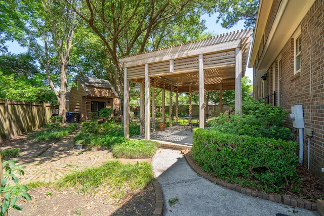 712 Wakendaw Blvd, Mount Pleasant, SC 29464 - fenced backyard featuring a pergola, a patio, and an outdoor structure